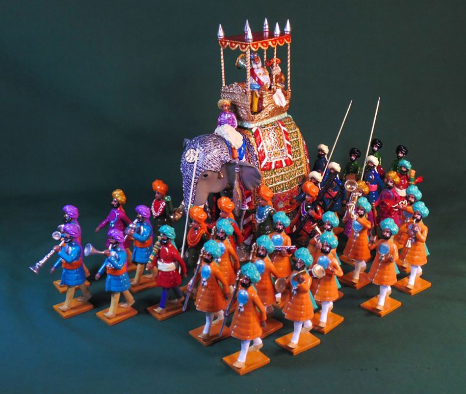 The Orchha Elephant, with guards, orderlies and musicians.